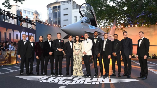 The cast and crew posed for photographs on the red carpet before the screening began.