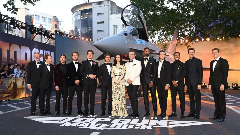 The cast and crew posed for photographs on the red carpet before the screening began.