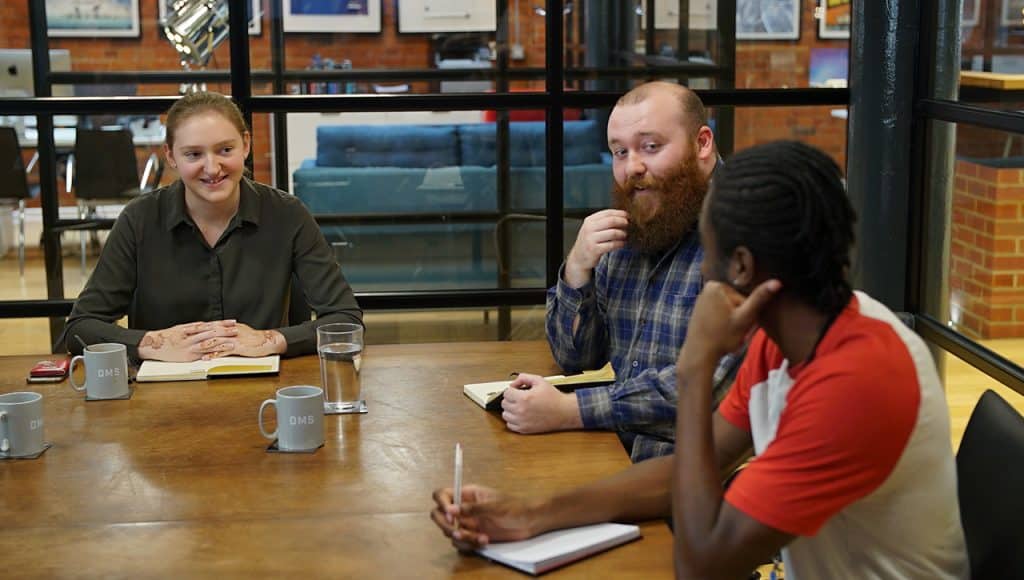 DMS staff in a meeting