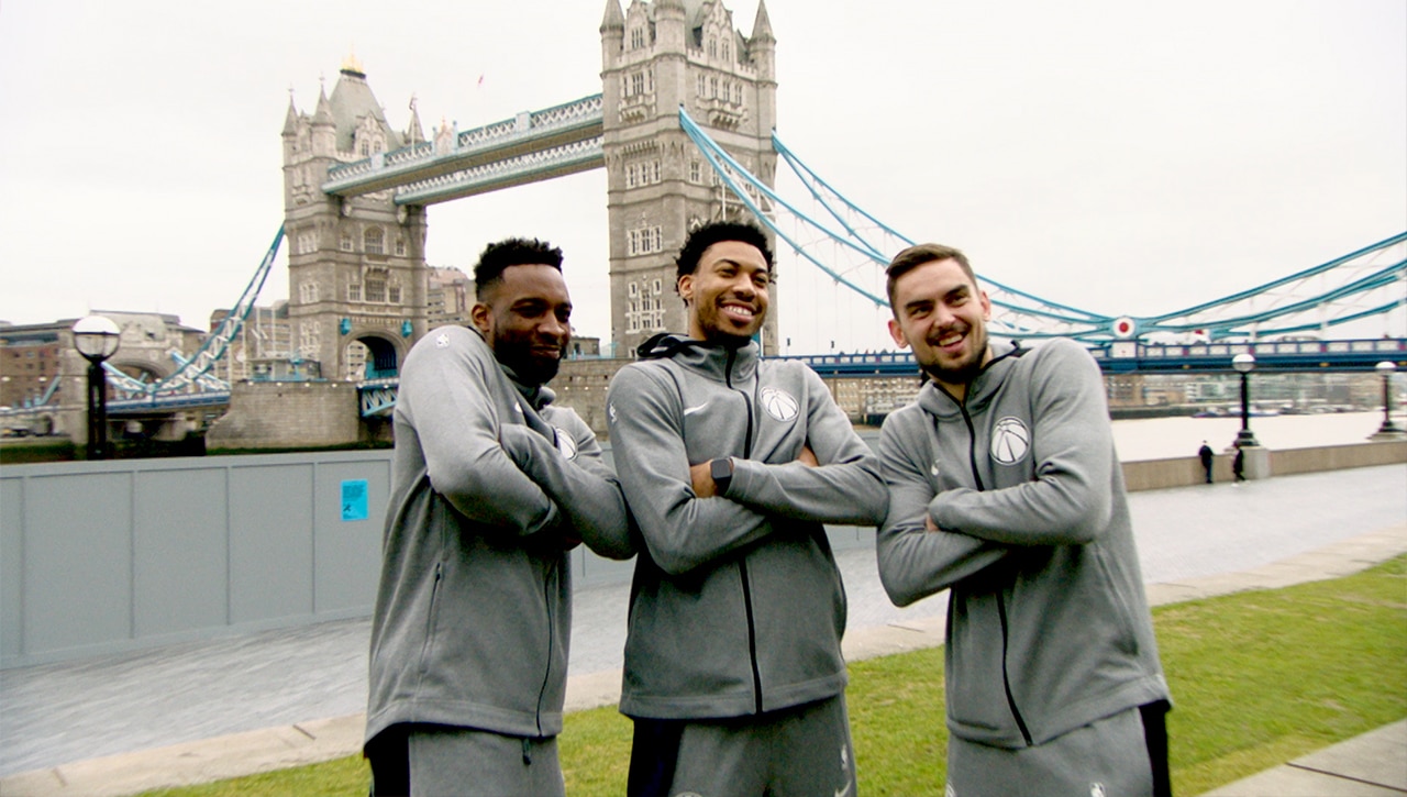NBA players posing near DMS London Bridge HQ